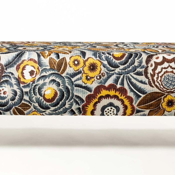 Floral fabric ottoman with gold legs