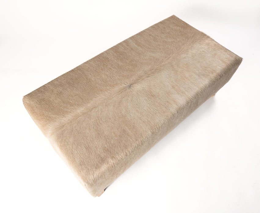Beige cowhide ottoman from the top