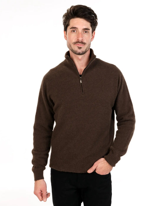 Man wearing a brown half-zip sweater made from possum merino