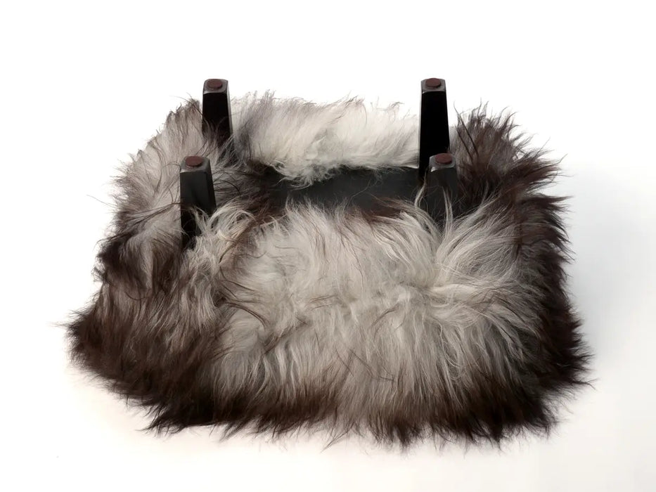 Yeti sheepskin footstool grey upside down legs