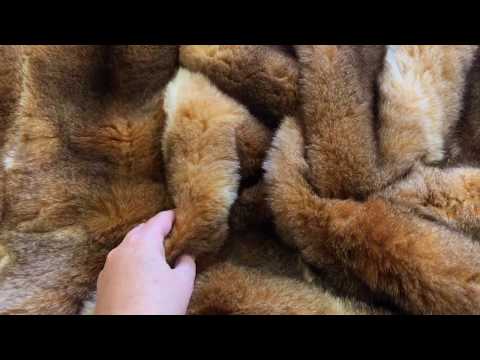 Video of honey possum fur throw in NZ