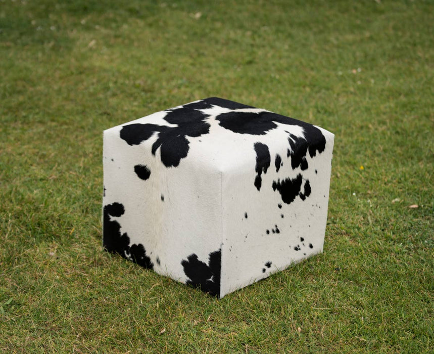 Black and white cowhide cube stool