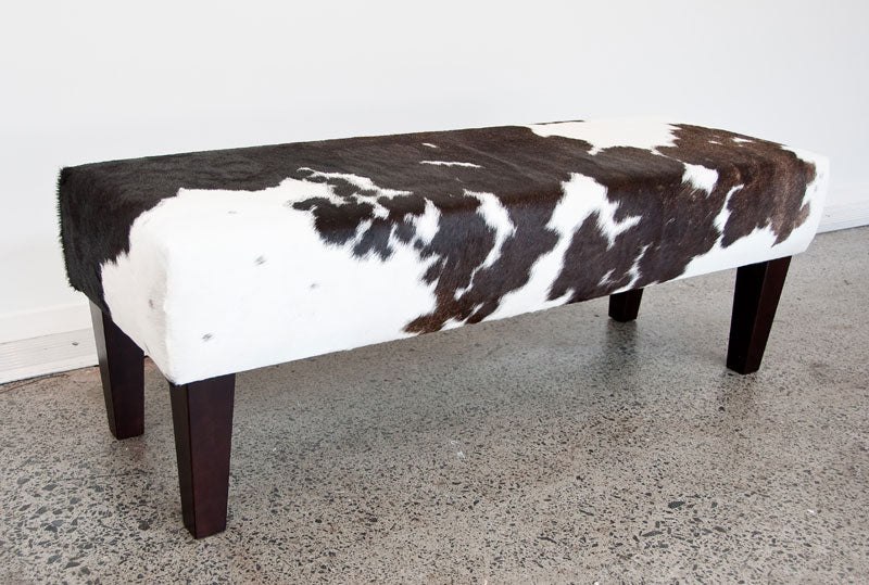 Long bench ottoman in cowhide