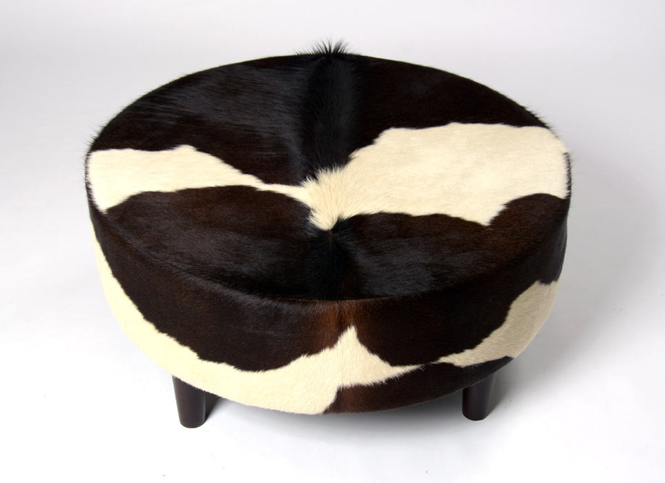 NZ cowhide ottoman round cream and chocolate