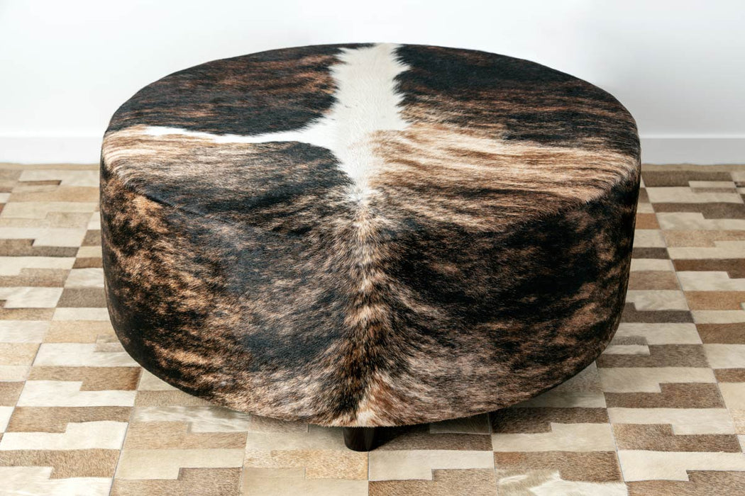 Deep round cowhide ottoman Gorgeous Creatures