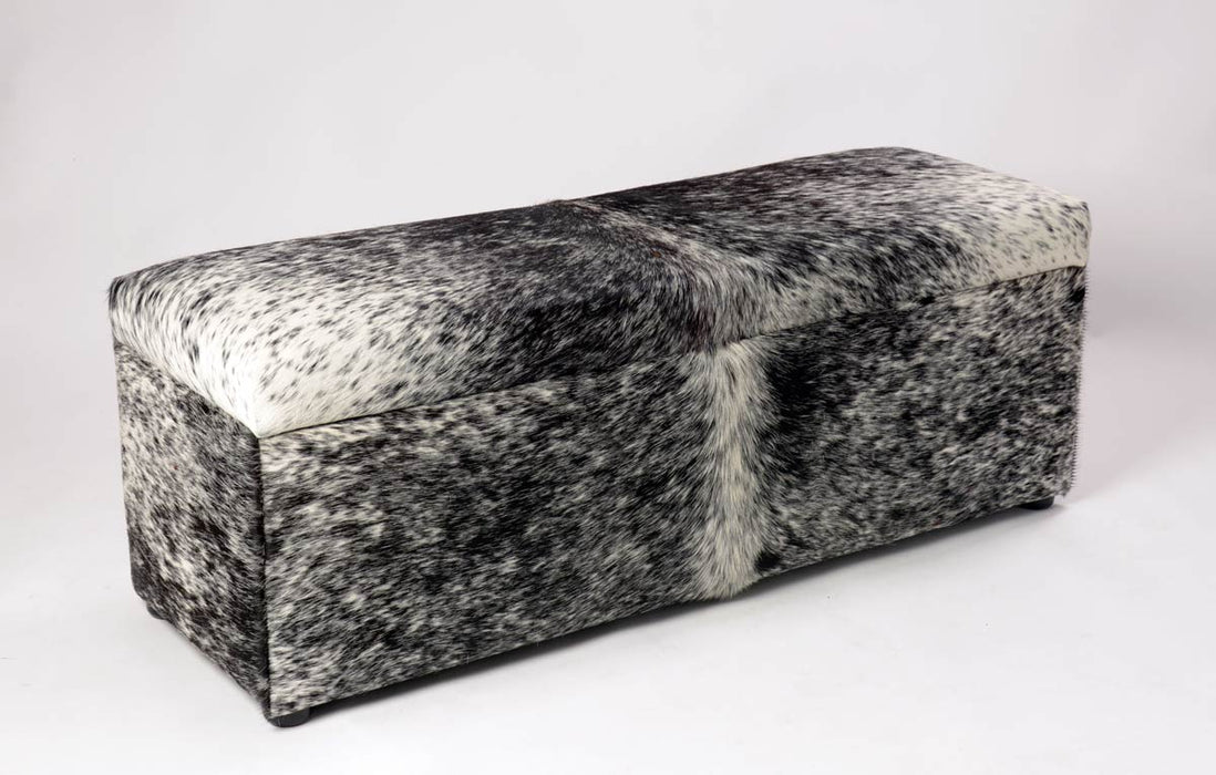 Large storage ottoman for bedroom in speckled cowhide