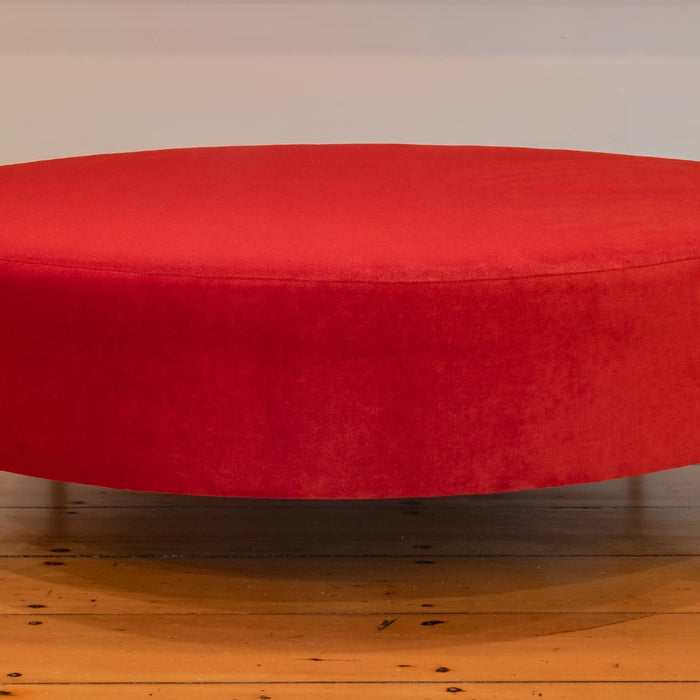 Art gallery style ottoman in bright velvet