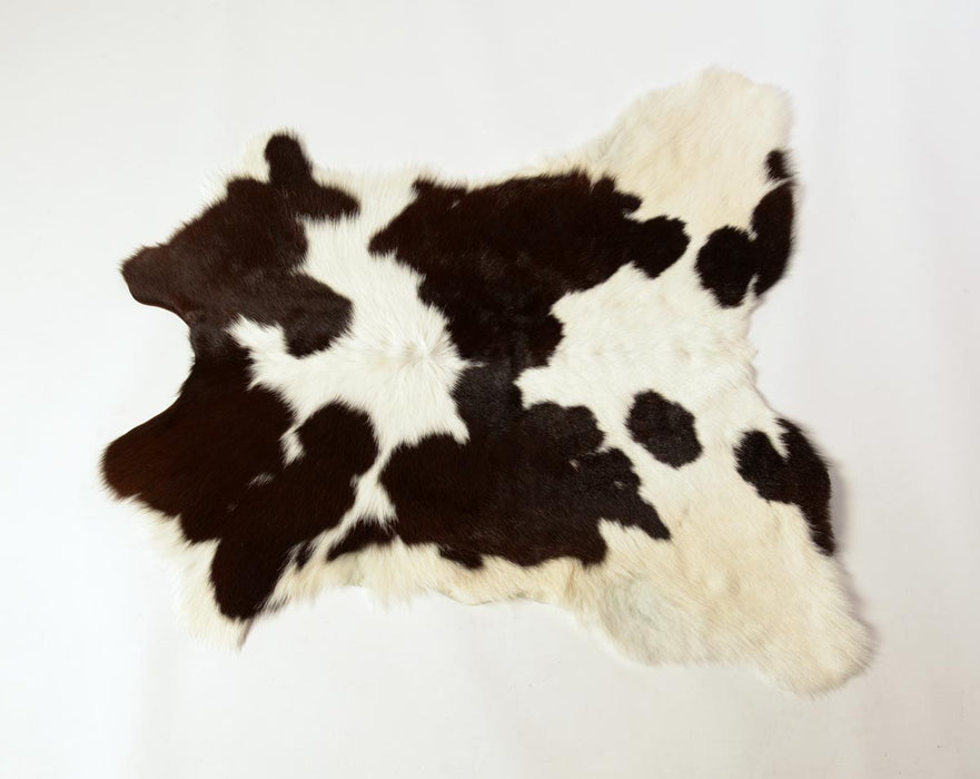 Warm black and white calfskin rug