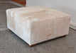 Square cowhide ottoman in beige cowhide