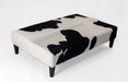 Very large black and white cowhide ottoman