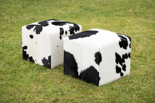 Black and white cowhide cube stool