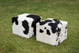 Black and white cowhide cube stool