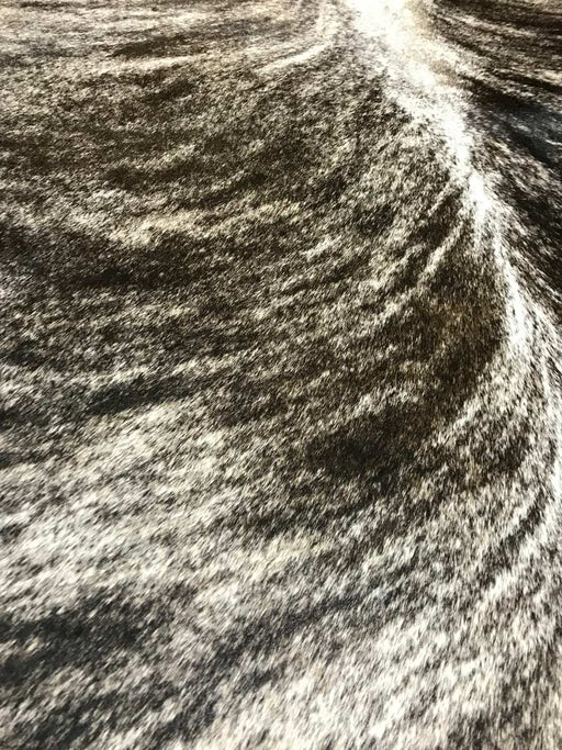 cowhide in shades of chocolate sand exotic mix detail