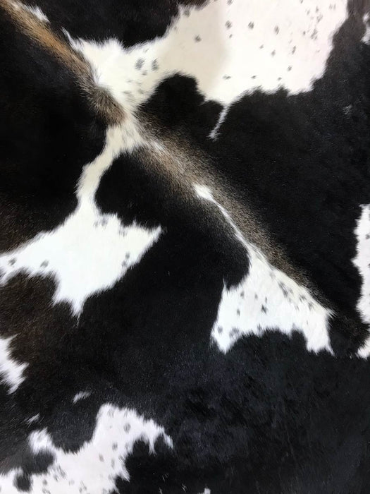 A lovely chocolate brown and white cowhide rug COW3210 