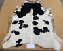 Black and white cowhide rug