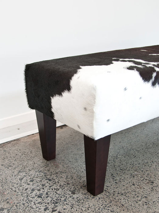 Long bench ottoman in cowhide