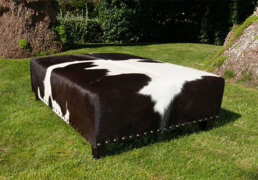 Cowhide Ottoman New Zealand with Wood Legs & Studs 120x90x40cm