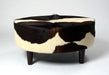 NZ cowhide ottoman round cream and chocolate