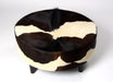 NZ cowhide ottoman round cream and chocolate