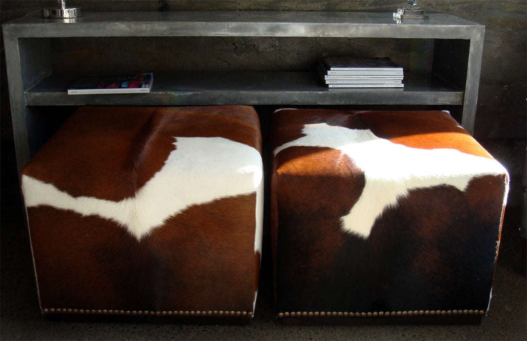 Square cowhide cubes with stud detailing