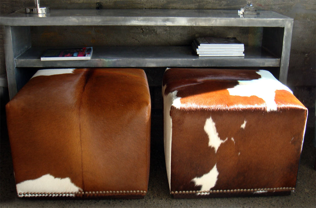 Square cowhide cubes with stud detailing