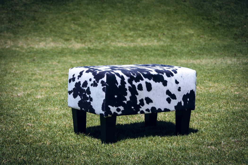Spotty fake cow skin fabric footstool 