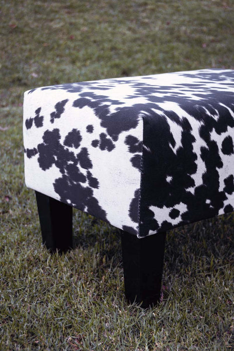 Spotty fake black & white cow skin fabric footstool 