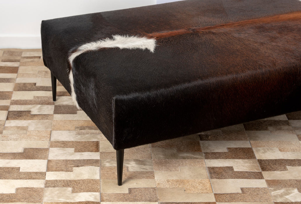 Rich dark brown cowhide ottoman