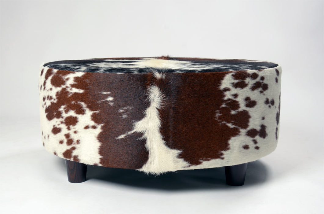 Round cowhide ottoman low 10cm wood legs