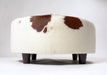 Round cowhide ottoman low 10cm wood legs