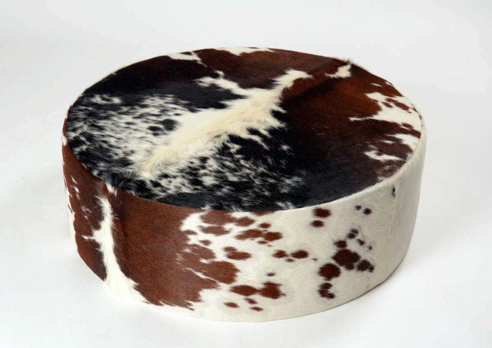 Round cowhide ottoman brown and white