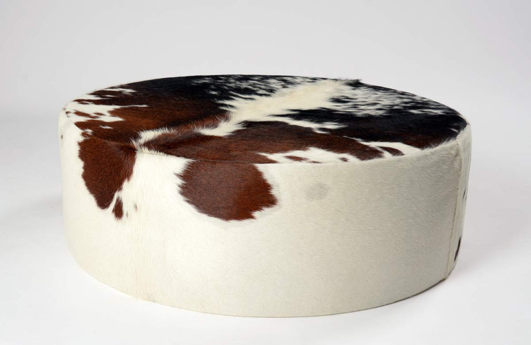 Round cowhide ottoman brown and white