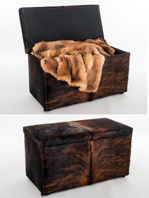 Storage ottoman in cowhide by Gorgeous Creatures