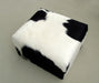 Cube ottoman footstool black and white cowhide