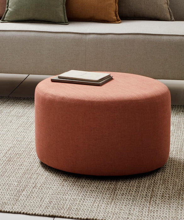 Round ottoman in Husk fabric by Gorgeous Creatures