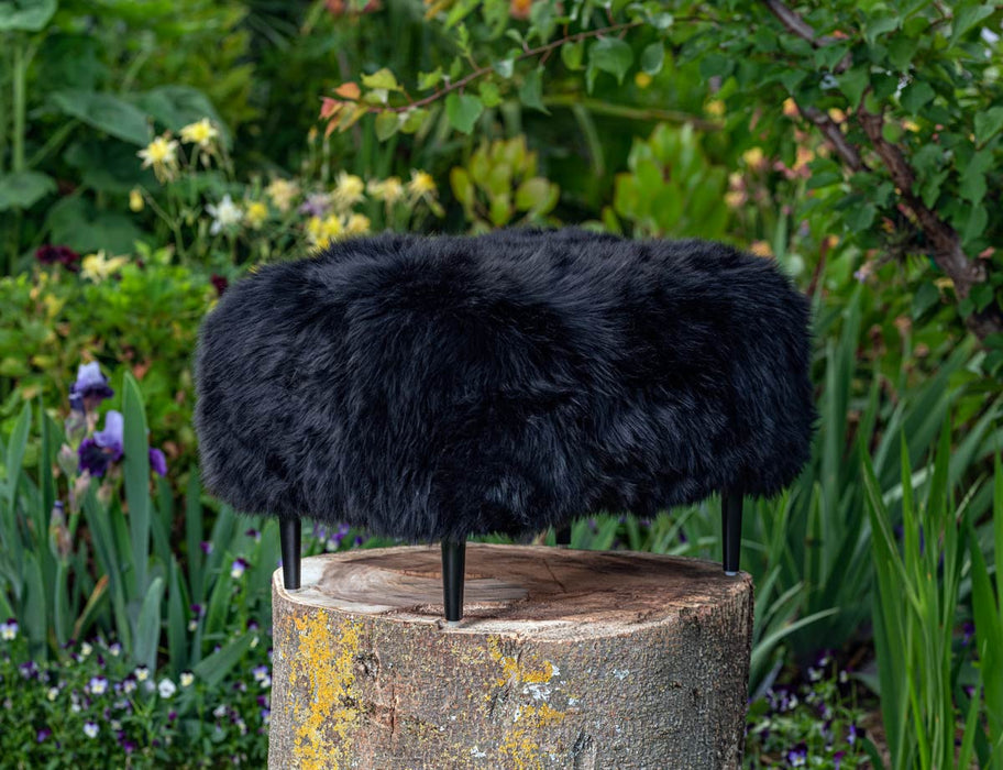 NZ black sheepskin footstool
