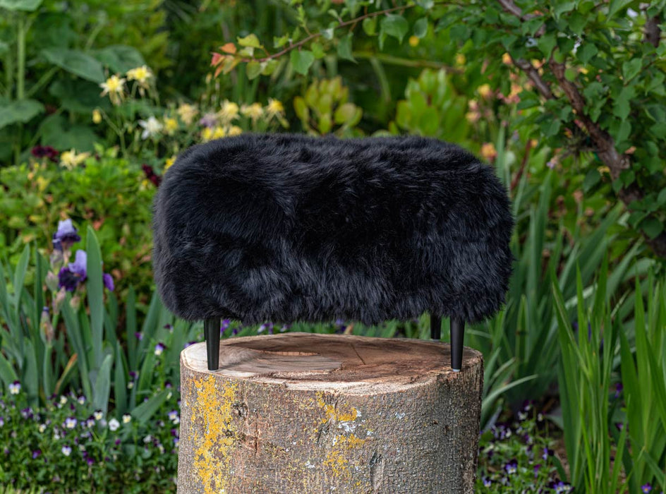 NZ black sheepskin footstool