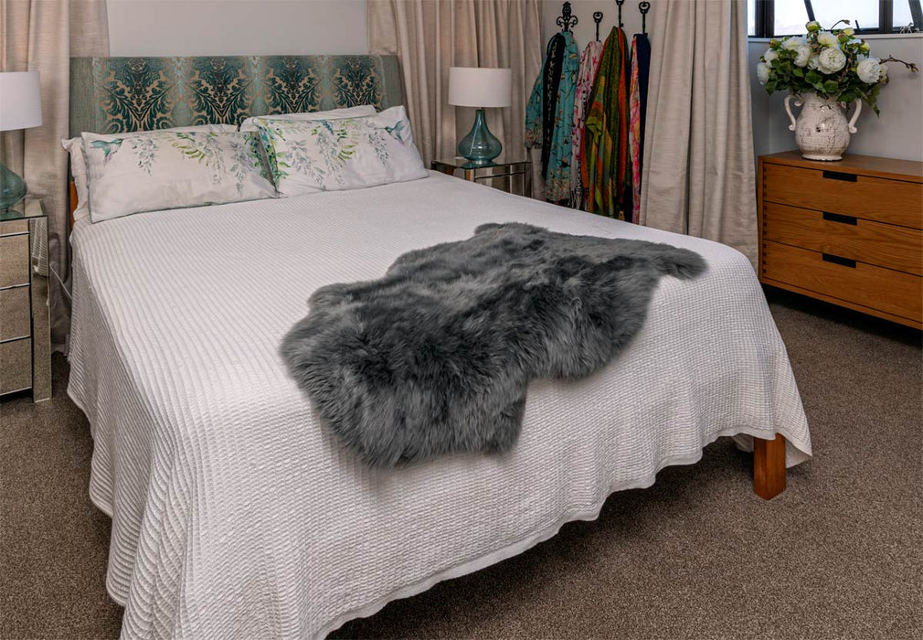 Grey Sheepskin Rug on bed NZ made