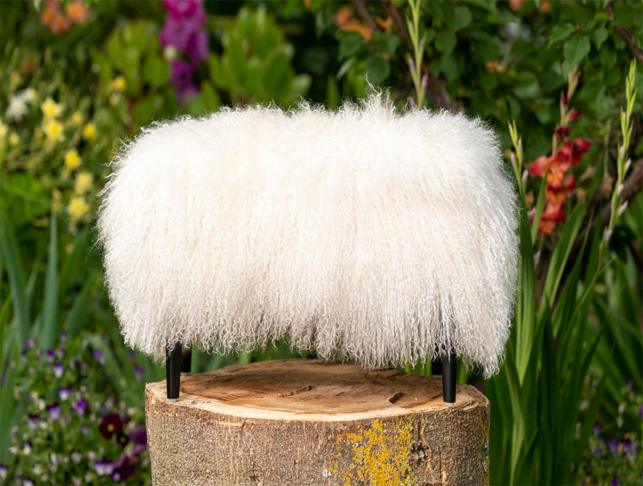 White Tibetan Lambskin Footstool black legs