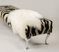 White Tibetan Lamb Skin on zebra ottoman