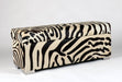 Storage ottoman in zebra print 120x40x45cm