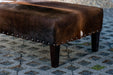 Cowhide Ottoman with Wood Legs & Antique Copper Studs 120x60x35cm