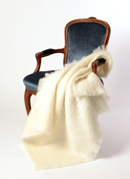 Cream Mohair Blanket over a chair