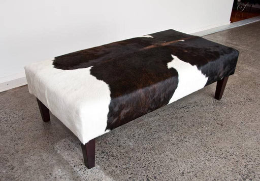 Cowhide Ottoman with Wood Legs 130x65x40cm