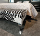 End of bed zebra print cowhide ottoman Queen Anne legs